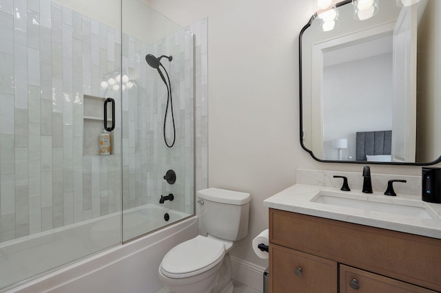 full bath featuring toilet, vanity, and bath / shower combo with glass door