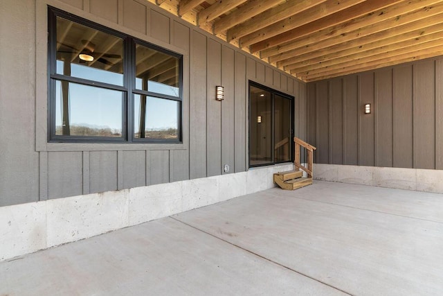 doorway to property with board and batten siding