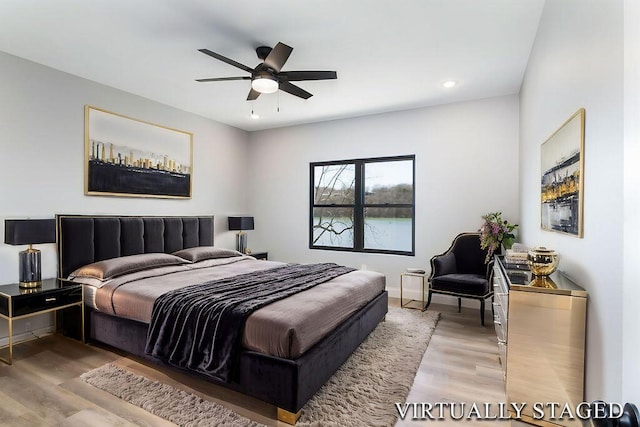 bedroom with recessed lighting, baseboards, wood finished floors, and a ceiling fan