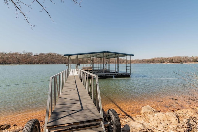 view of dock with a water view