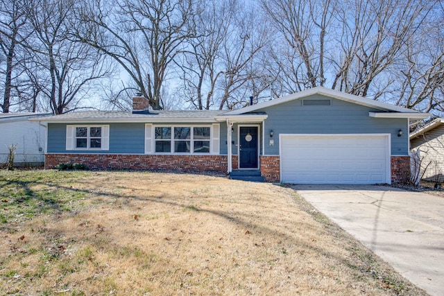 single story home featuring brick siding, concrete driveway, a front yard, a chimney, and an attached garage