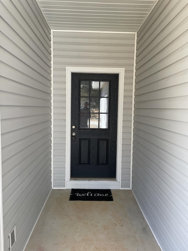 doorway to property with visible vents