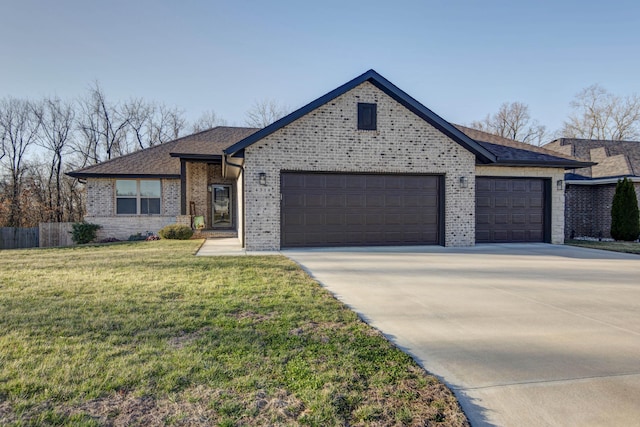 view of front of house with fence, an attached garage, concrete driveway, a front lawn, and brick siding