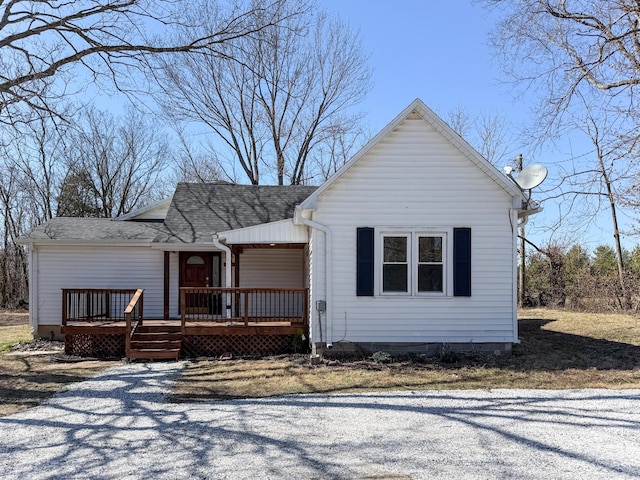 view of front of home with roof with shingles