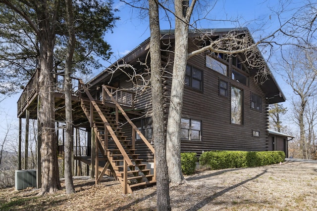 view of property exterior with stairway