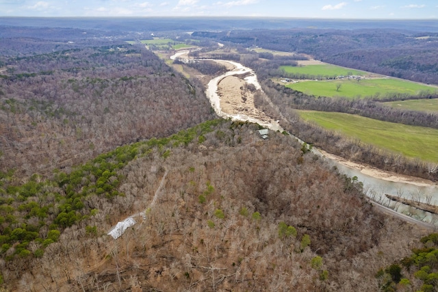 drone / aerial view with a view of trees