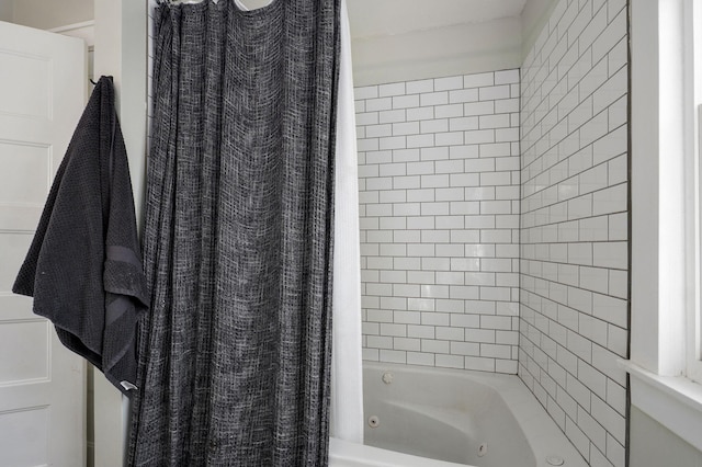 bathroom featuring a combined bath / shower with jetted tub