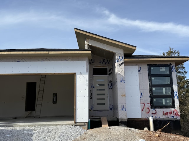 property entrance featuring a garage