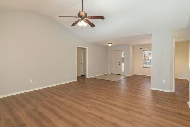 175 Mesquite Dr, Branson, MO 65616 - unfurnished living room with lofted ceiling, wood finished floors, baseboards, and ceiling fan