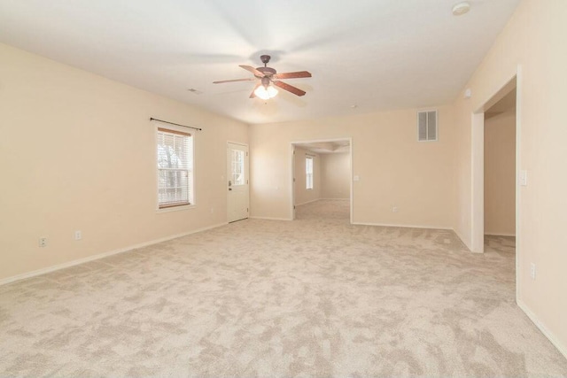 175 Mesquite Dr, Branson, MO 65616 - empty room featuring a ceiling fan, light colored carpet, visible vents, and baseboards