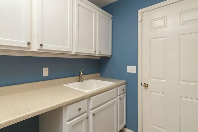175 Mesquite Dr, Branson, MO 65616 - laundry room featuring a sink
