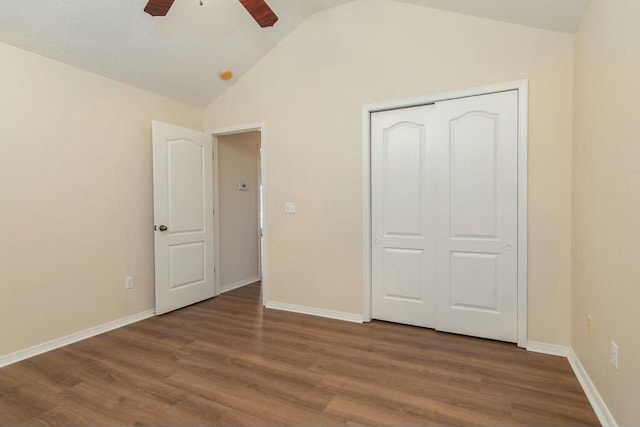 175 Mesquite Dr, Branson, MO 65616 - unfurnished bedroom with vaulted ceiling, wood finished floors, baseboards, and a closet