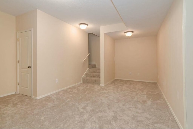 175 Mesquite Dr, Branson, MO 65616 - finished below grade area featuring stairs, baseboards, and carpet floors