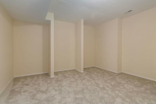 175 Mesquite Dr, Branson, MO 65616 - finished basement featuring visible vents, baseboards, and carpet flooring