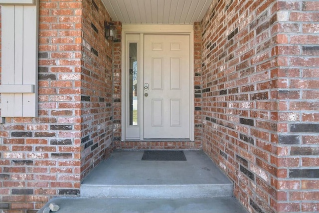 175 Mesquite Dr, Branson, MO 65616 - view of exterior entry featuring brick siding
