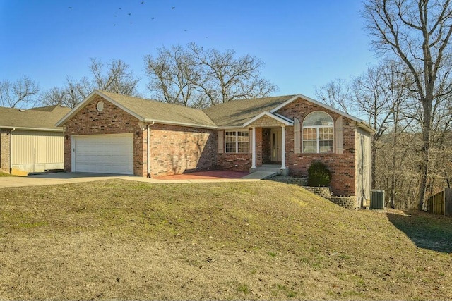 ranch-style home featuring a front yard, central AC, concrete driveway, a garage, and brick siding