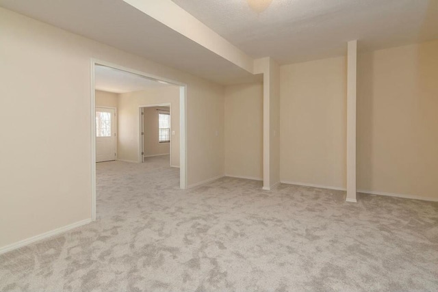 175 Mesquite Dr, Branson, MO 65616 - below grade area featuring baseboards and carpet floors