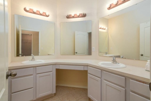 175 Mesquite Dr, Branson, MO 65616 - full bathroom featuring tile patterned flooring, double vanity, and a sink