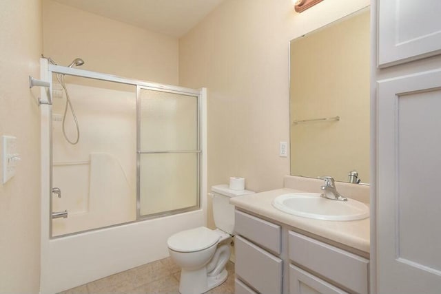 175 Mesquite Dr, Branson, MO 65616 - full bath featuring enclosed tub / shower combo, tile patterned flooring, toilet, and vanity