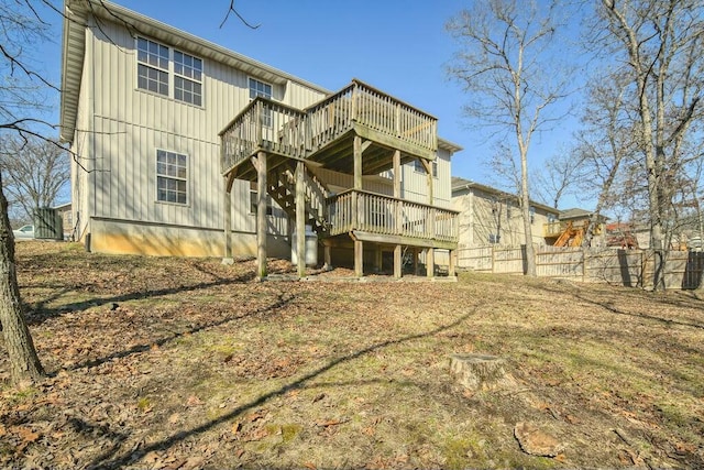 175 Mesquite Dr, Branson, MO 65616 - back of property with a wooden deck, stairs, and fence