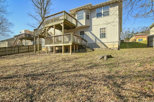175 Mesquite Dr, Branson, MO 65616 - back of house with stairway, a wooden deck, and fence
