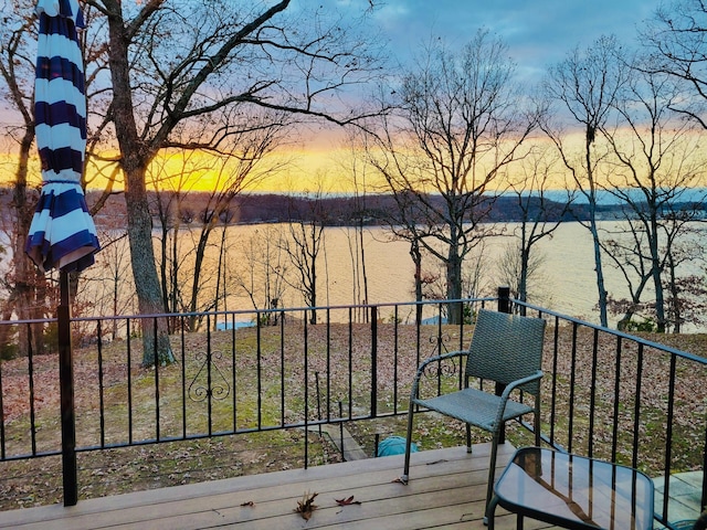 view of balcony at dusk