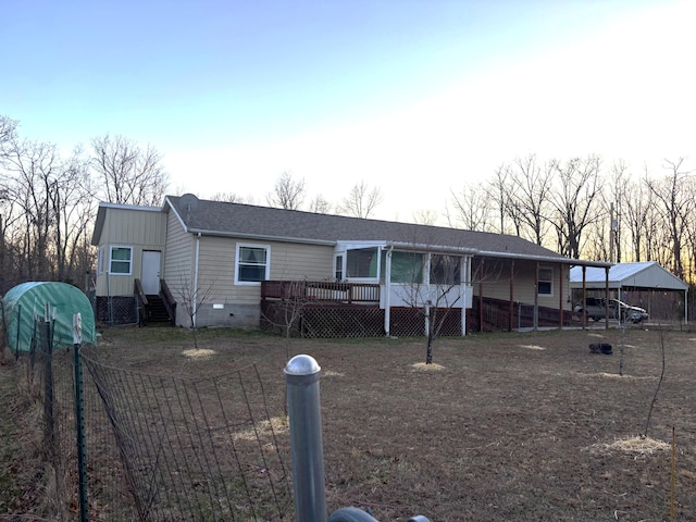 view of front facade with crawl space, a wooden deck, and a shingled roof