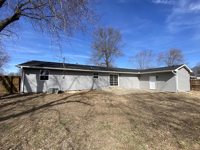 back of property with a patio, central AC, and fence