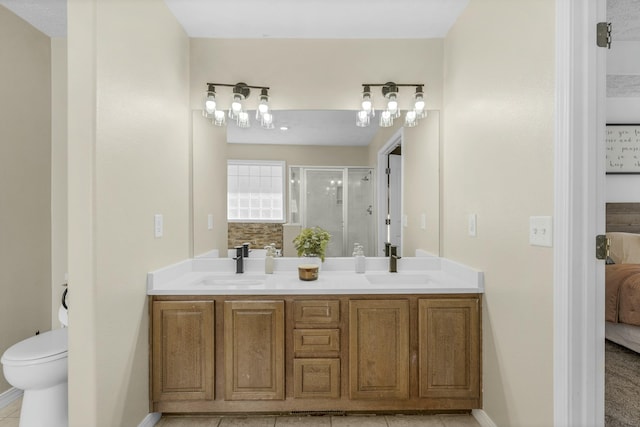 bathroom with double vanity, a stall shower, ensuite bath, and a sink