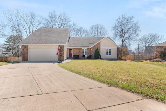 view of front of property with a garage, concrete driveway, a front lawn, and fence