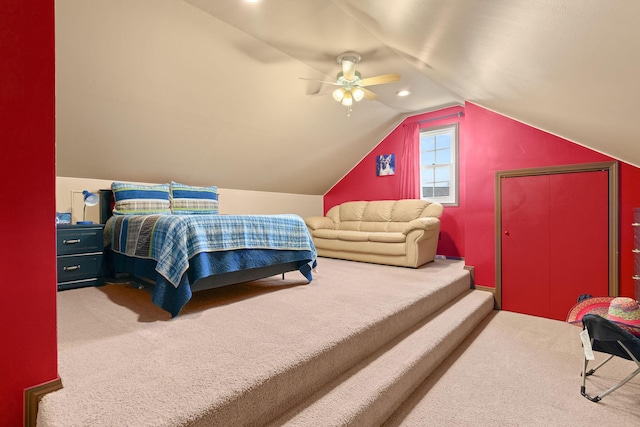 carpeted bedroom featuring lofted ceiling, recessed lighting, and a ceiling fan