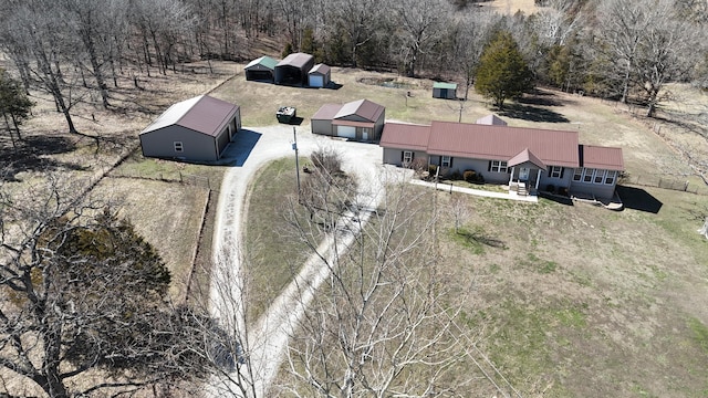 birds eye view of property featuring a rural view