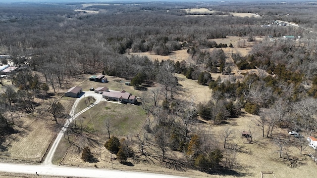 bird's eye view with a rural view and a view of trees