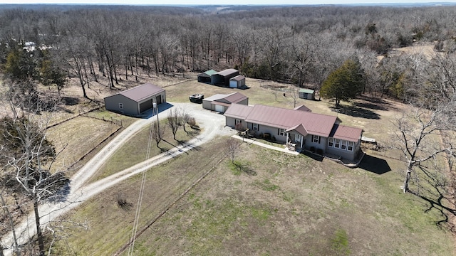 bird's eye view featuring a forest view