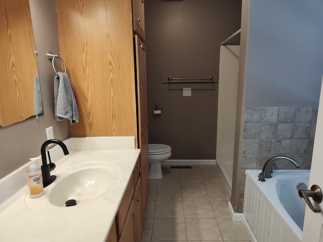 full bath with toilet, a tub to relax in, tile patterned flooring, baseboards, and vanity