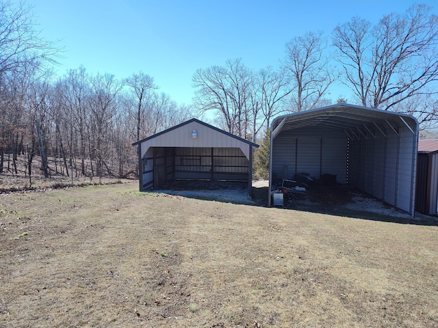 exterior space featuring a carport and dirt driveway