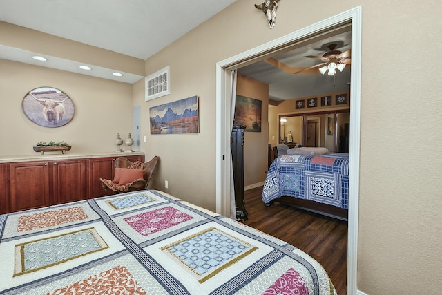 bedroom featuring recessed lighting, dark wood-style flooring, and baseboards