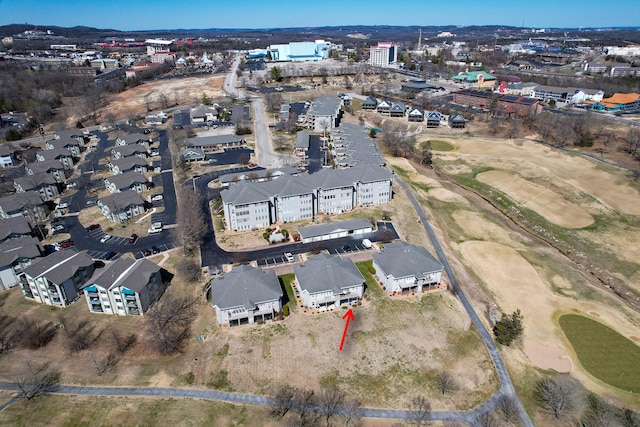 birds eye view of property with a residential view