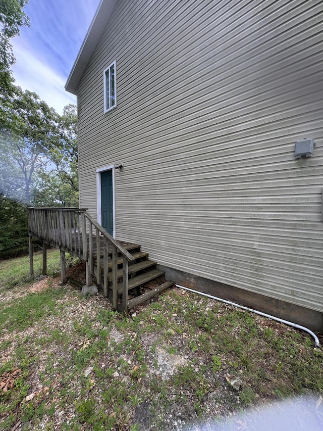 view of home's exterior featuring a deck