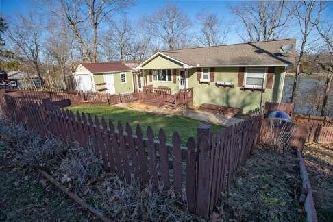 view of front of house featuring fence private yard