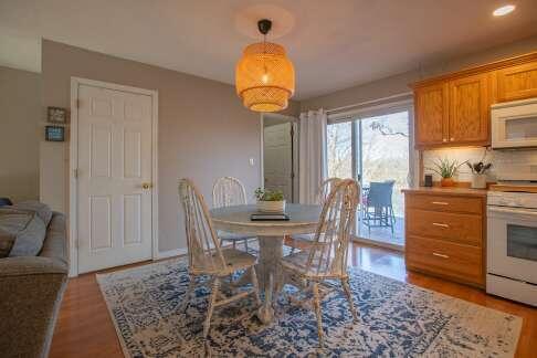 dining space featuring light wood finished floors