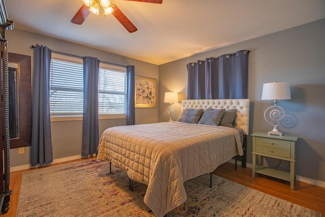 28007 Fox Fire Ln, Shell Knob, MO 65747 - bedroom featuring wood finished floors, baseboards, and ceiling fan