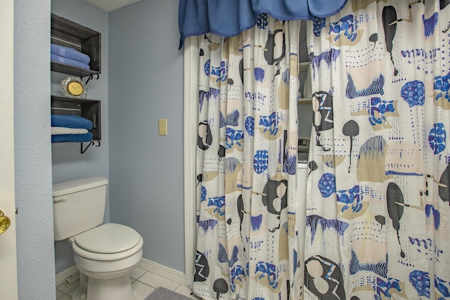 28007 Fox Fire Ln, Shell Knob, MO 65747 - bathroom featuring toilet, baseboards, tile patterned flooring, and a shower with curtain
