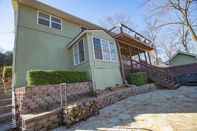 28007 Fox Fire Ln, Shell Knob, MO 65747 - view of home's exterior featuring stairs, a hot tub, and a patio area
