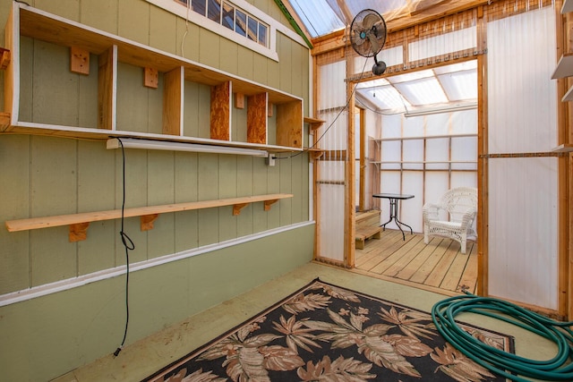 28007 Fox Fire Ln, Shell Knob, MO 65747 - unfurnished sunroom featuring a skylight and vaulted ceiling