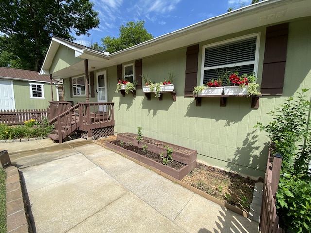 28007 Fox Fire Ln, Shell Knob, MO 65747 - view of exterior entry featuring a patio