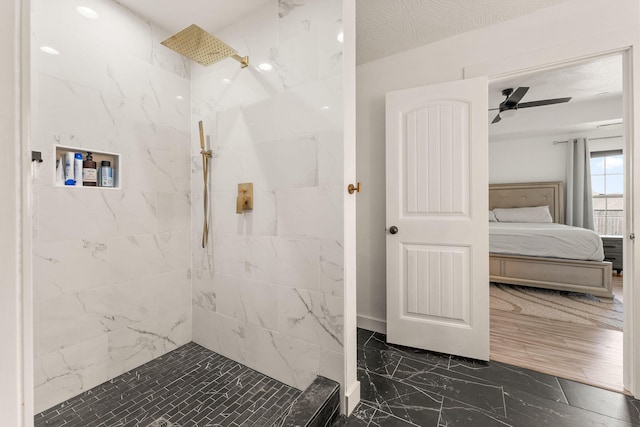 full bath with ceiling fan, marble finish floor, ensuite bathroom, and tiled shower