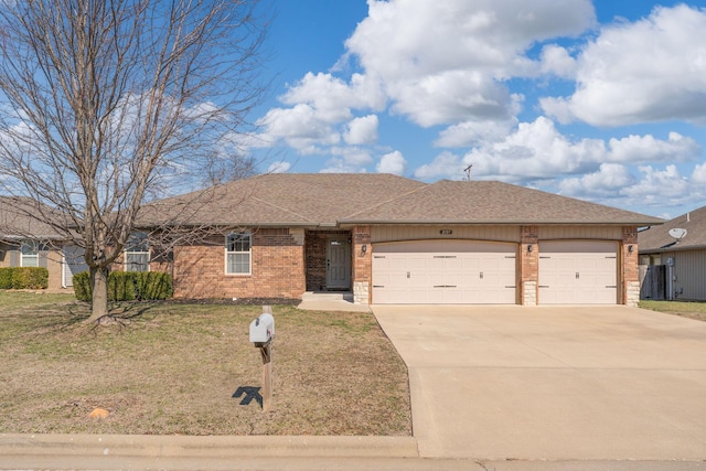 ranch-style house featuring brick siding, a shingled roof, a front yard, driveway, and an attached garage