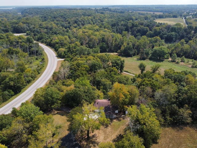 aerial view featuring a view of trees