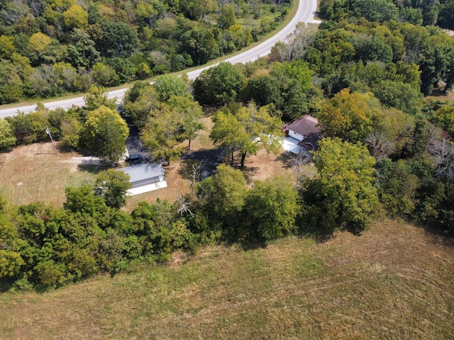 bird's eye view featuring a view of trees